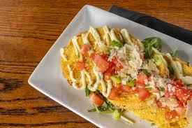 The City Cellar & Loft signature dishes Shrimp and Grits
Fried Green Tomatoes
Cowboy Burger